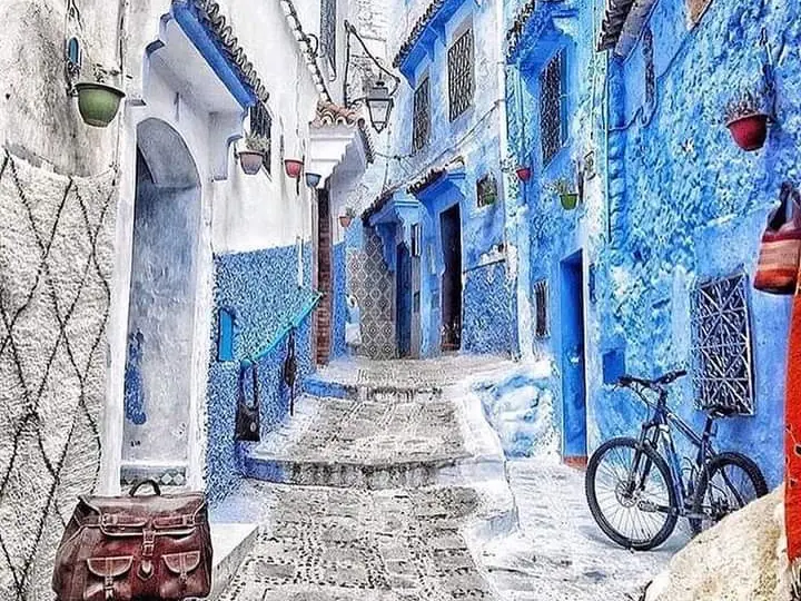 Blue-painted street in the Chefchaouen medina, the last stop of the 7-day tour from Marrakech